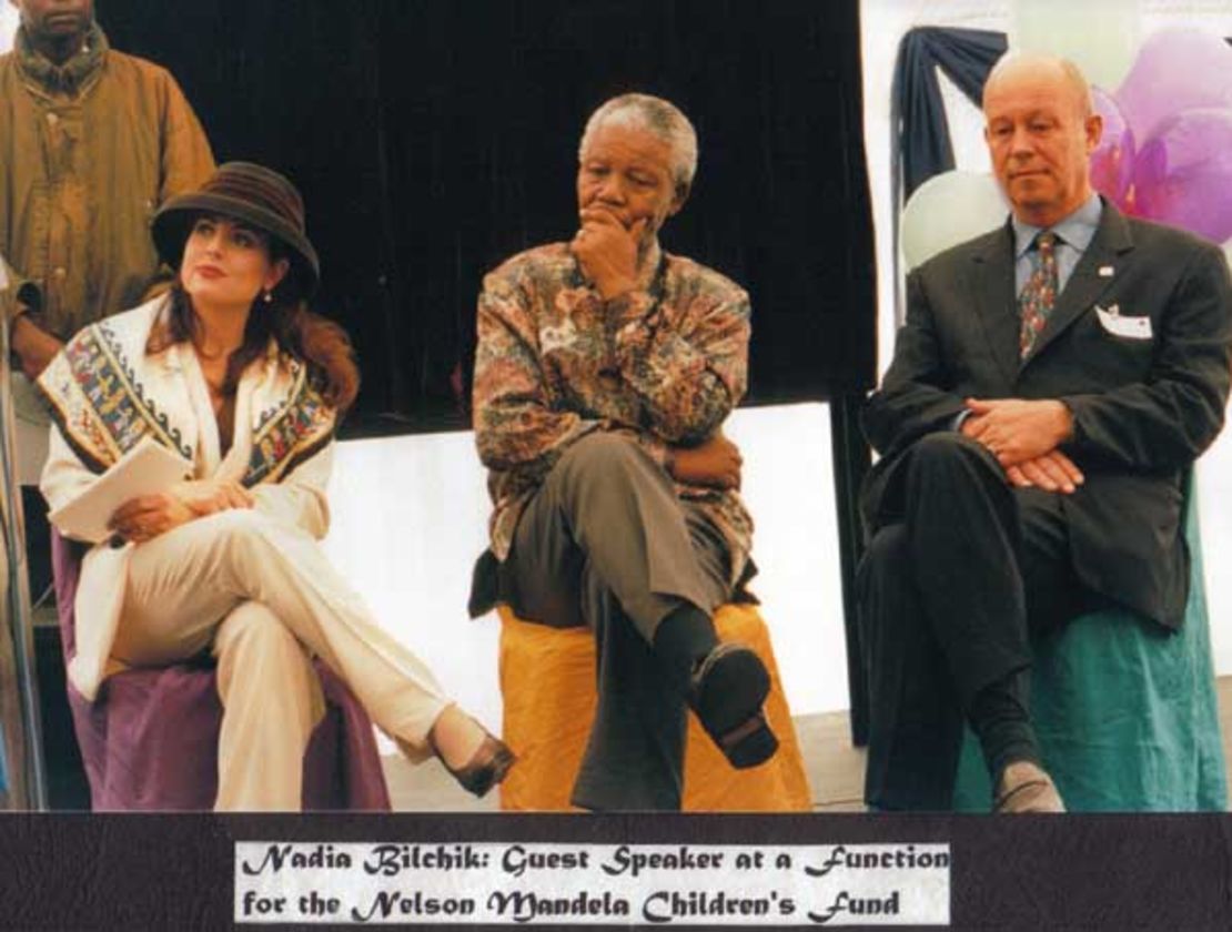 Nadia Bilchik attends an event with Nelson Mandela.