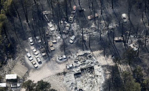 An aerial view on June 13 shows destroyed house and vehicles after the Black Forest Fire passed through Black Forest, Colorado.