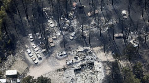 An aerial view on June 13 shows destroyed house and vehicles after the Black Forest Fire passed through Black Forest, Colorado.
