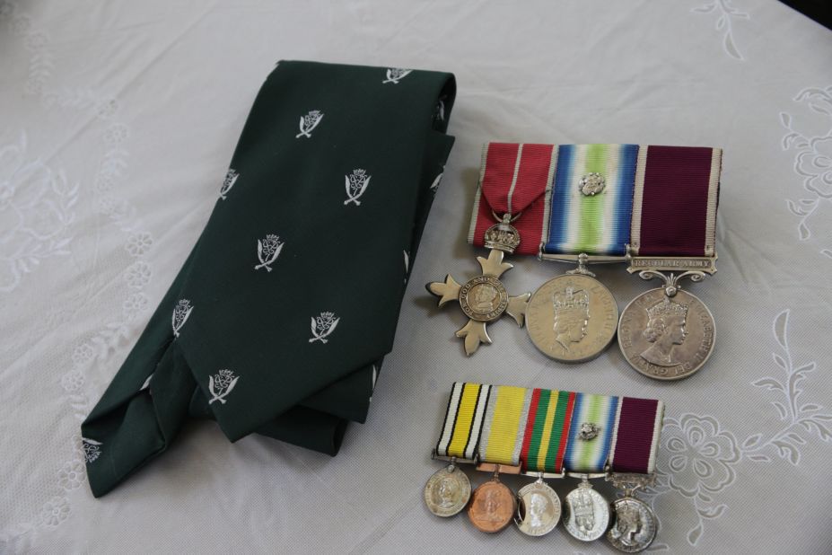 Throughout their long military careers, the men earned a number of decorations. Their regimental tie carries the famous crest featuring crossed Gurkha Kukri knives.
