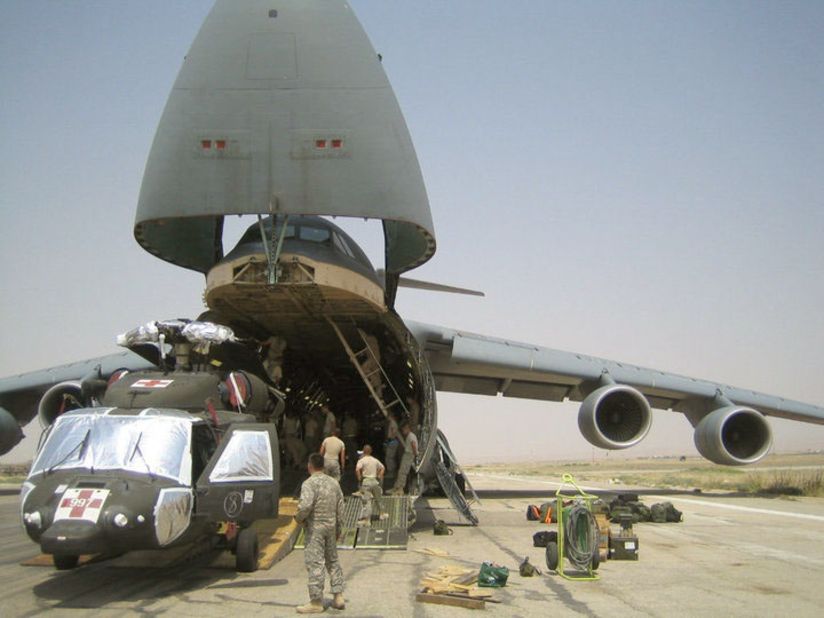 The C-5, seen here in Afghanistan, moves entire units of fighting forces and their battle machines such as helicopters, trucks and tanks around the world at <a href="http://www.af.mil/information/factsheets/factsheet.asp?id=84" target="_blank" target="_blank">jet speeds around 518 mph. </a>Its nose opens the full width and height of the cargo bay for quick, easy loading.