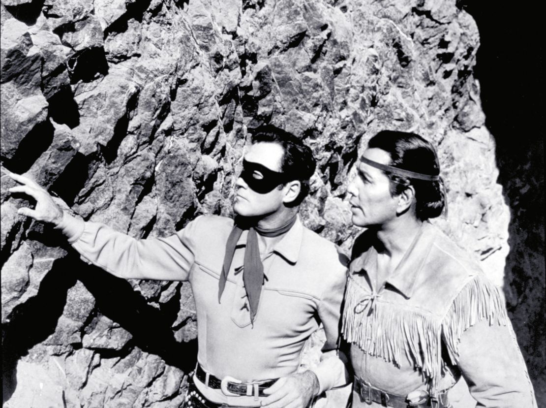 Moore and Silverheels scope out the situation as The Lone Ranger and Tonto.