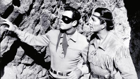 Moore and Silverheels scope out the situation as The Lone Ranger and Tonto.