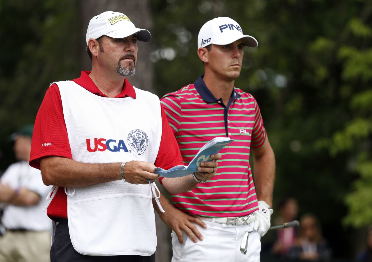 Billy Horschel of the United States waits on the 16th tee with caddie Micah Fugitt during round two on June 14.