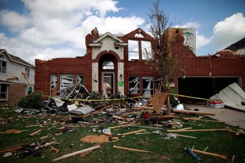 A tornado-damaged home in Forney, Texas, lies in ruin on April 4, 2012. Tornadoes across the greater Dallas-Fort Worth area in early April caused an estimated $1 billion in damage.