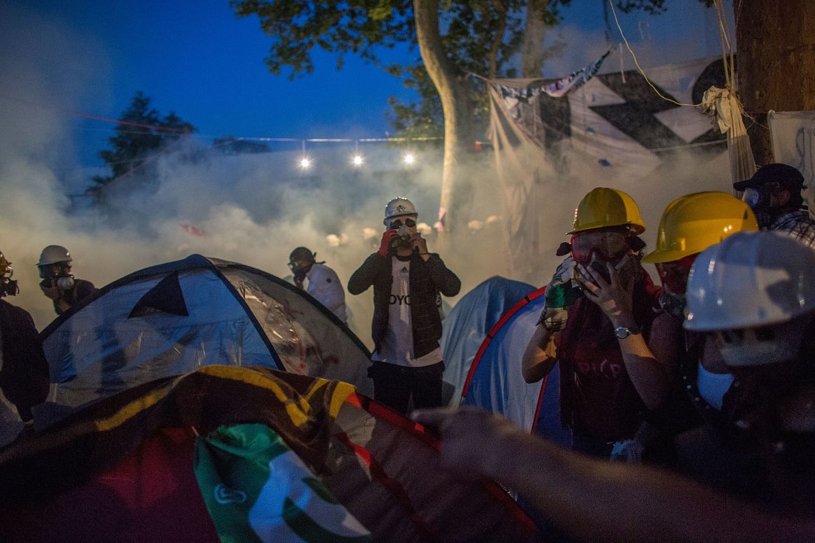 Protesters escape from tear gas during the crackdown  at Gezi Park on June 15.