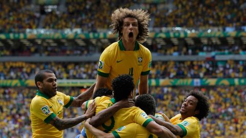 David Luiz, center, led the celebrations after Neymar's opener for Brazil against Japan. 