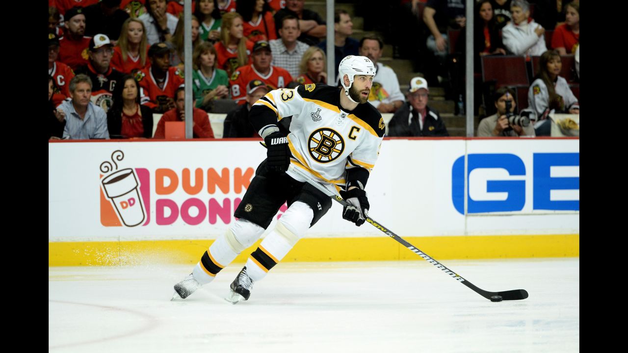  Zdeno Chara of the Boston Bruins skates with the puck in the first period.