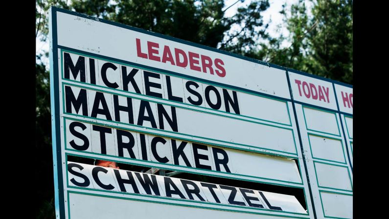 The names of Phil Mickelson of the United States, Hunter Mahan of the United States, Steve Stricker of the United States and Charl Schwartzel of South Africa are seen on a leaderboard during the final round on June 16.