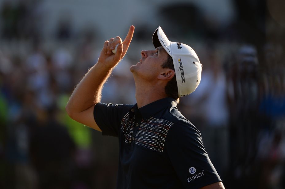 Justin Rose looks skyward apparently in recognition of his deceased father after putting on the 18th hole to win the 113th U.S. Open at Merion Golf Club on June 16, in Ardmore, Pennsylvania.
