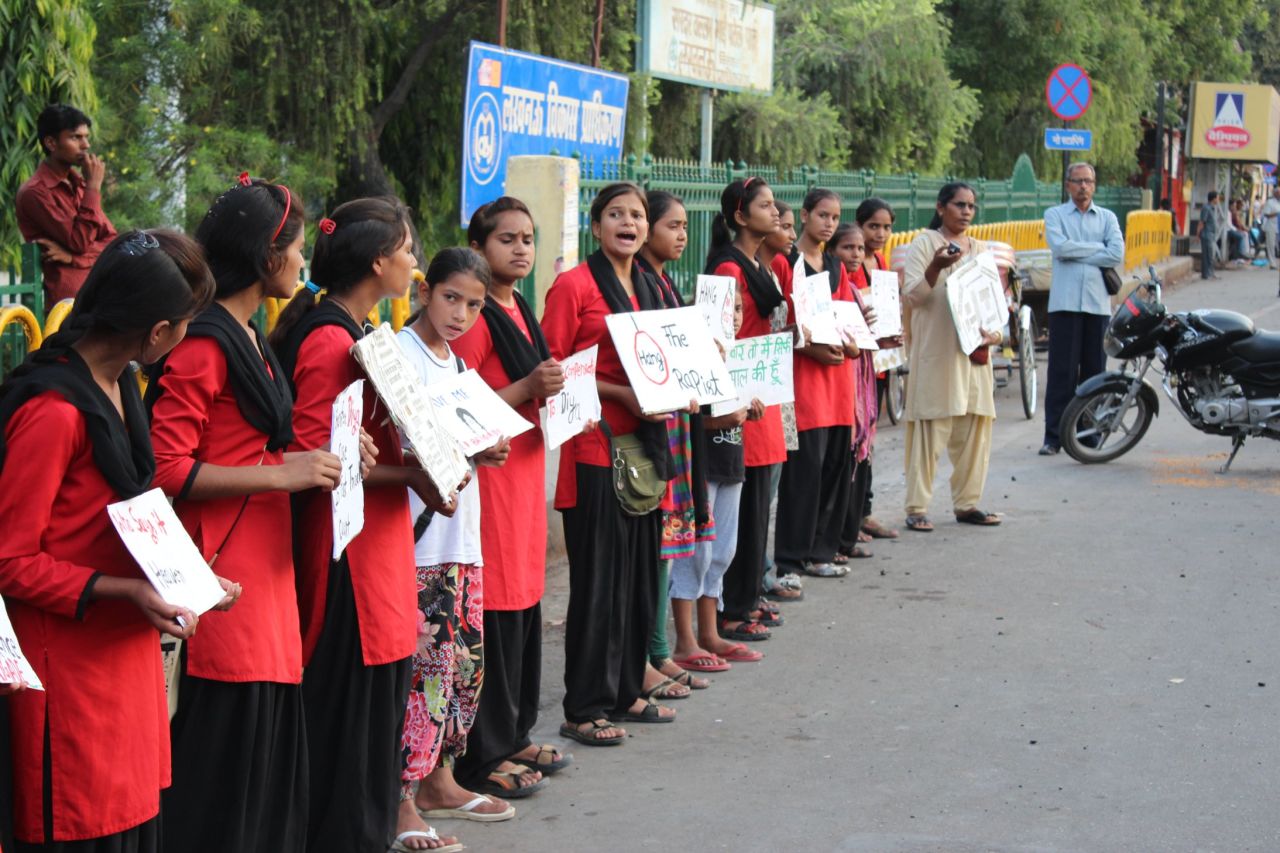 But the reality is the girls face their biggest fight on the streets trying to persuade society of the need for change.
