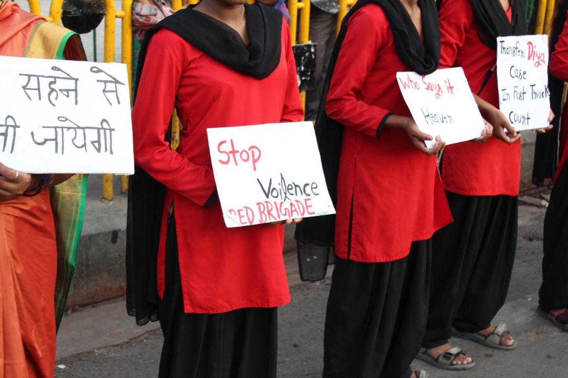 The small band of girls brave one of the busiest intersections in the city of Lucknow to get their message across ...