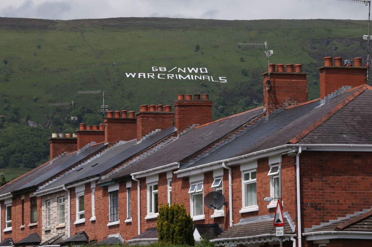 Giant letters on a hillside overlooking Belfast, Northern Ireland, display a message from protesters on June 17.