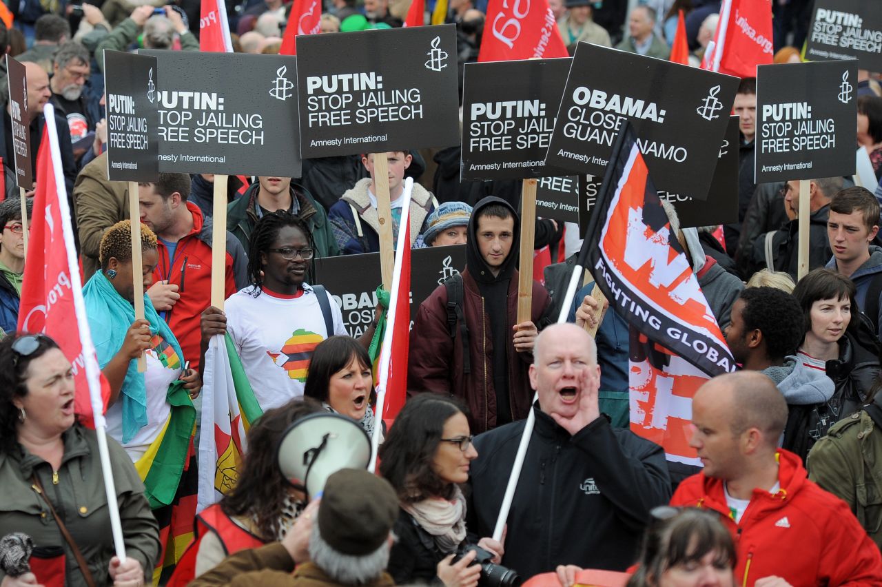 Protesters join a planned rally in Belfast on June 15.