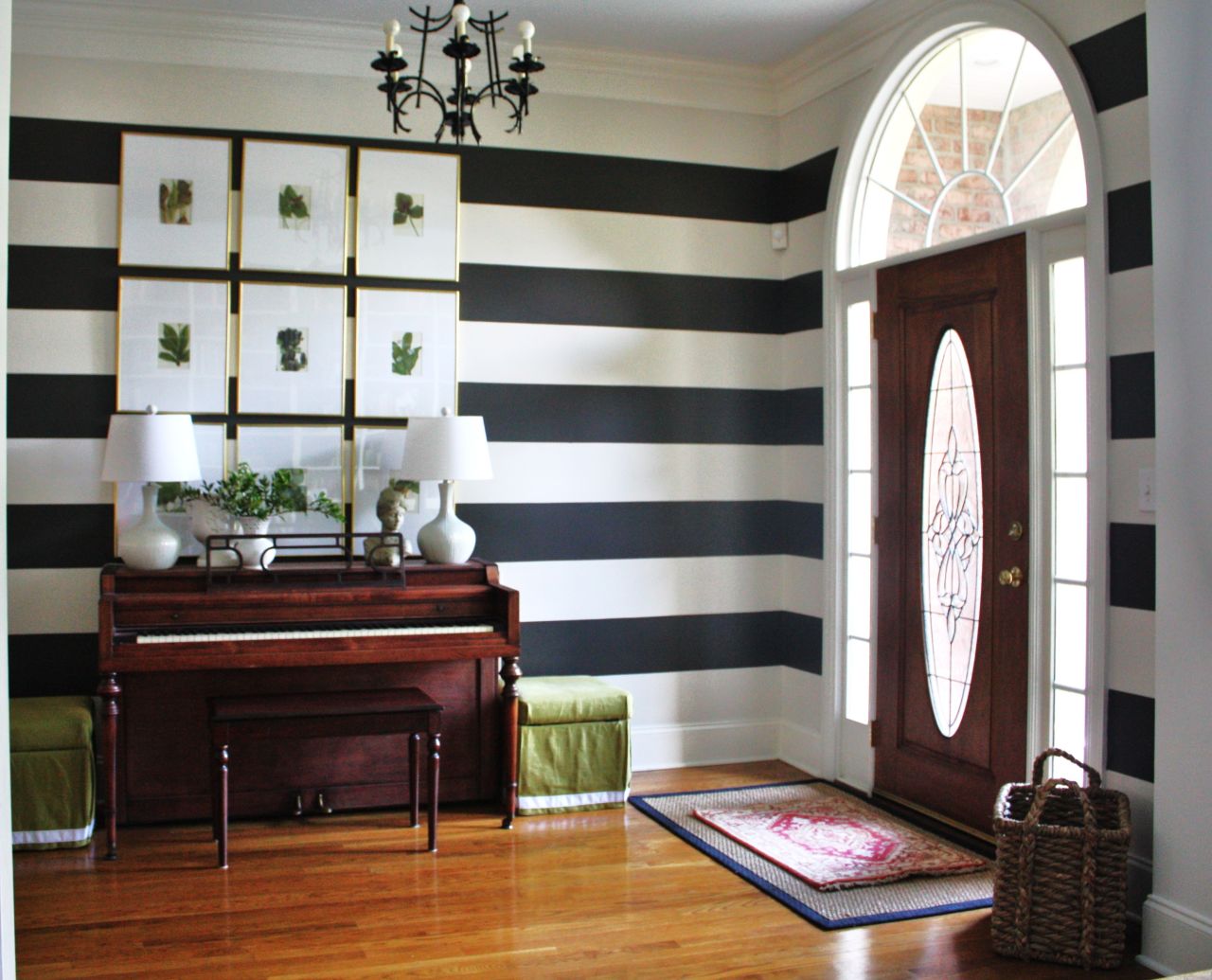 <a href="http://ireport.cnn.com/docs/DOC-986389">Emily Clark'</a>s bold, striped foyer -- which also functions as a music room -- in Charlotte, North Carolina, is a playful take on formal decor.