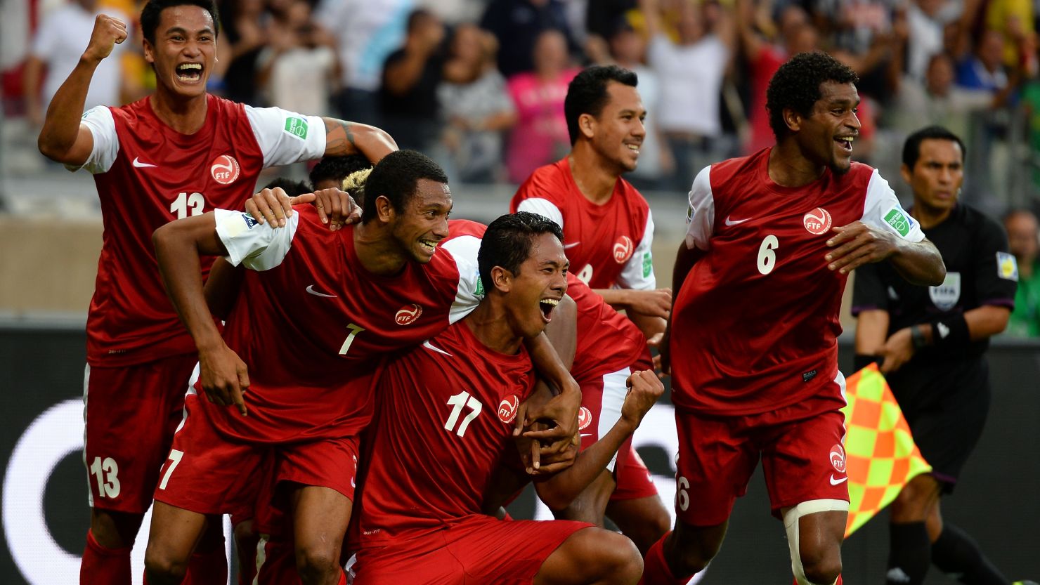 Tahiti's player celebrate Jonathan Tehau's historic goal in their 6-1 defeat to Nigeria in the Confederations Cup.