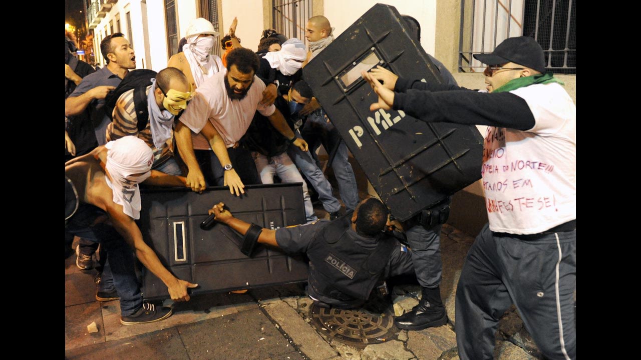 Protesters clash with riot police on June 17.