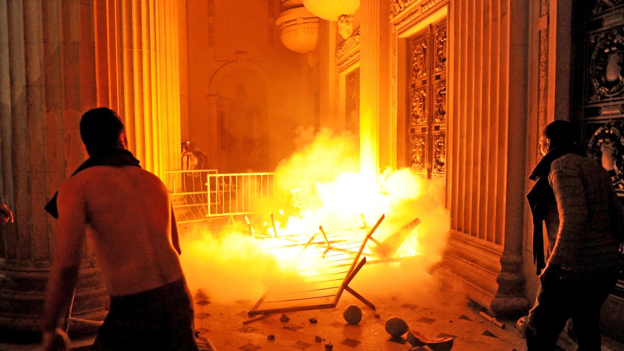 Demonstrators attempt to take Rio de Janeiro's Legislative Assembly (ALERJ) building-- during a protest in Rio de Janeiro, on June 17, 2013.