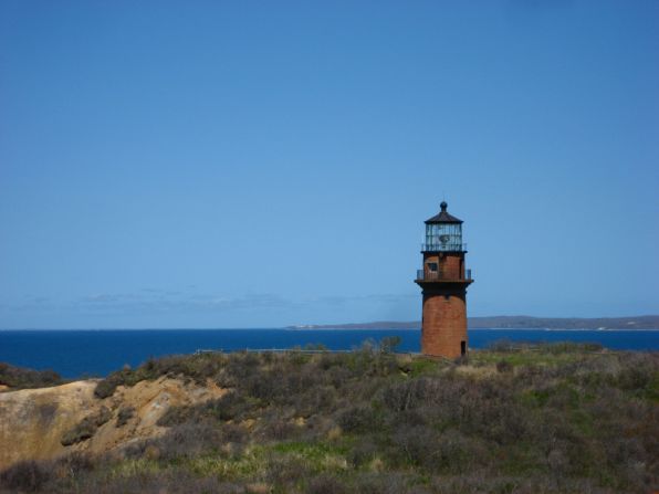 Gay Head Lighthouse in Aquinnah, Massachusetts, was the first lighthouse built on Martha's Vineyard. Gay Head is in danger of falling over Gay Head Cliffs. 