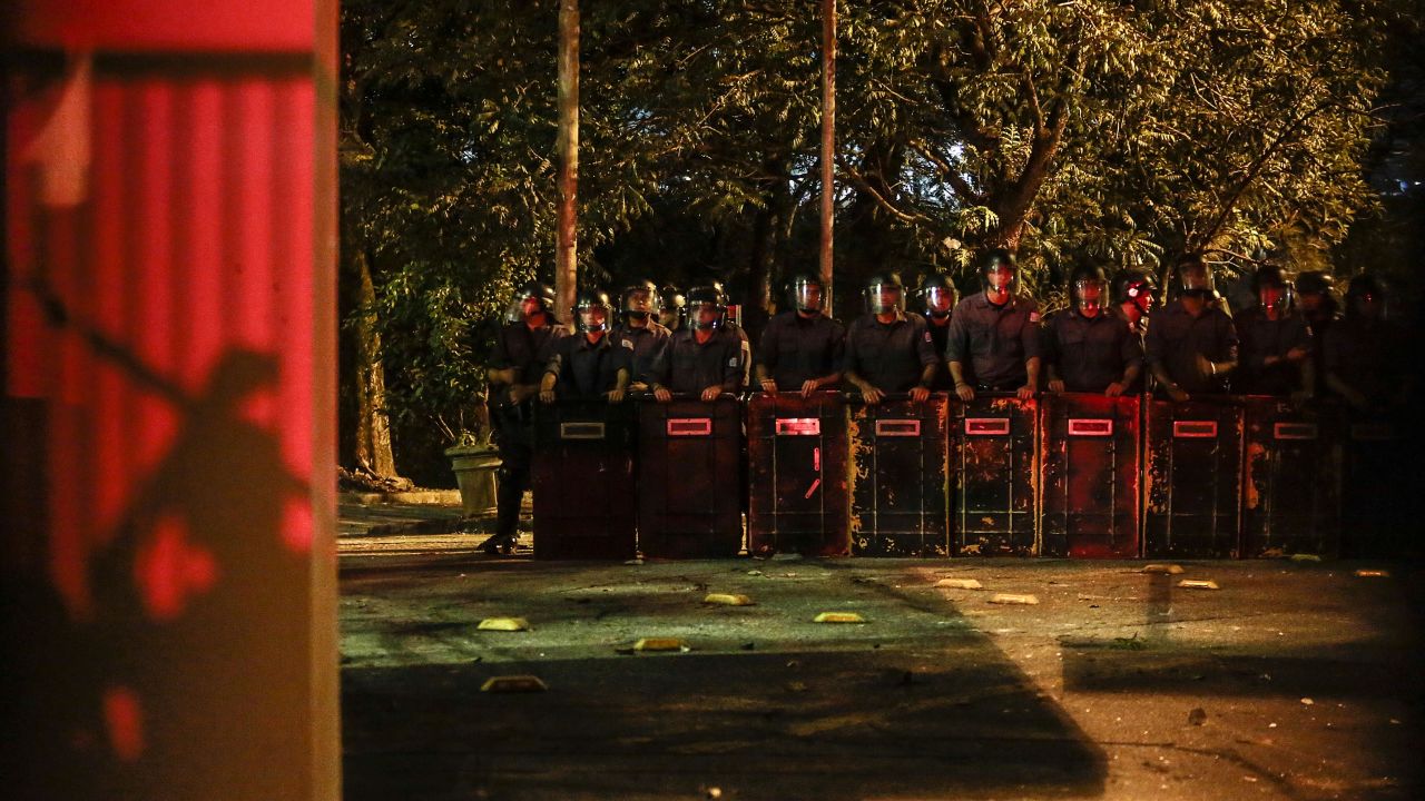 Riot police form a line outside the Government Palace in Sao Paulo, on Monday, June 17.