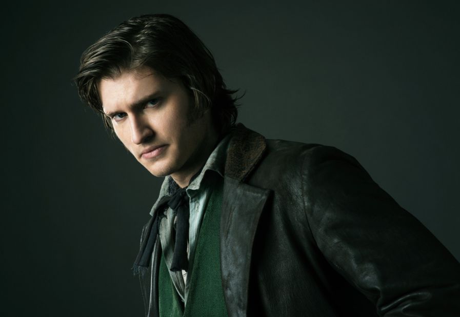 Detective Kevin Corcoran (Tom Weston-Jones) traverses the slums and uptown, so his look walks the line. His coat is historically accurate, but given a rakish edge by being made out of leather -- which was entirely unconventional. 