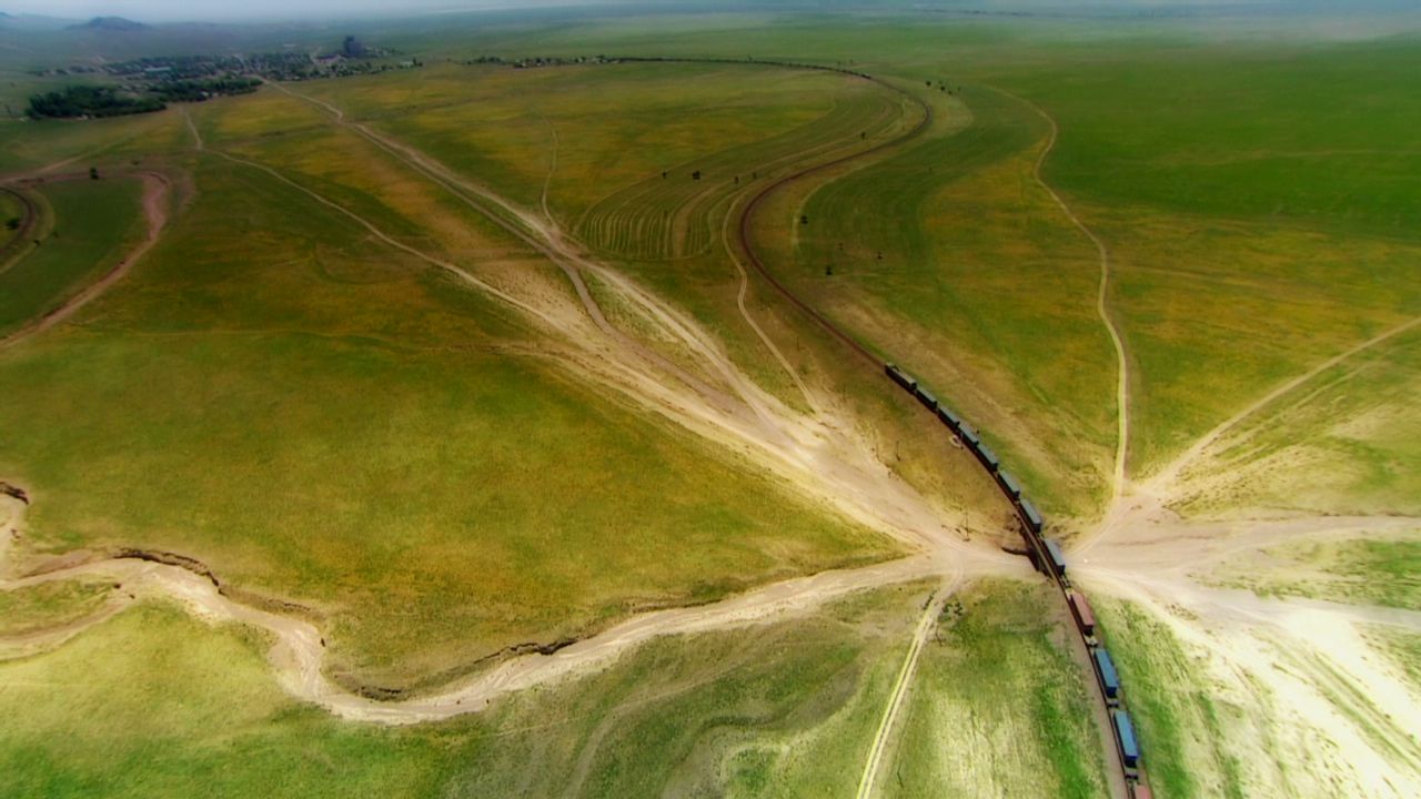 A train heads into the vast hinterland of rural Kazakhstan. An array of other routes for trans-continental rail travel have been identified by the likes of the United Nations Economic and Social Commission for Asia.
