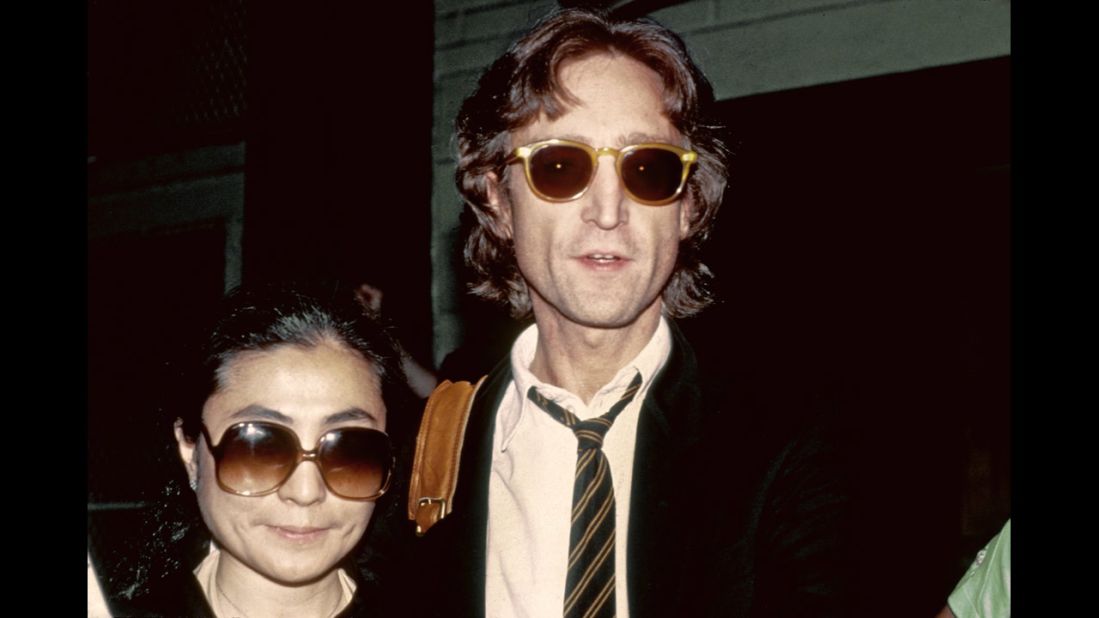 On December 8, 1980, an armed man, Mark Chapman, staked out the Manhattan apartment building where former Beatle John Lennon lived with his wife, Yoko Ono, and their young son. After receiving a signed copy of Lennon's latest album as the singer was leaving his home, Chapman waited until the couple returned to the apartment that night and shot Lennon in the back with a revolver. In this photo taken earlier that year, Lennon and Ono stand outside of the recording studio where he recorded his final album "Double Fantasy."