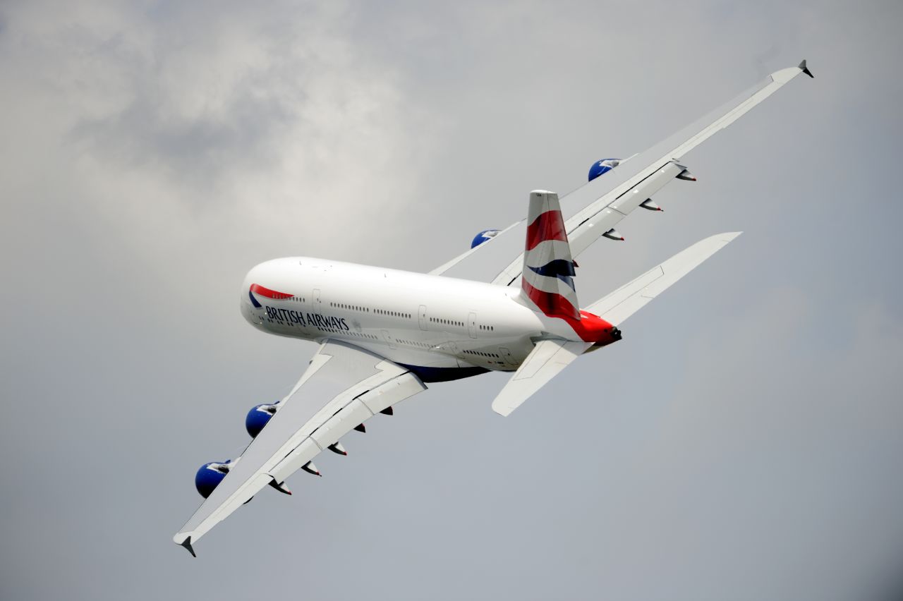 A British Airlines Airbus A380 flies over Le Bourget airport, near Paris, on June 18, 2013 during the 50th International Paris Air show. 