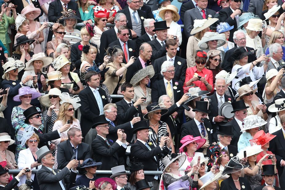 Top hats and demure dresses are a must for guests in the Royal Enclosure (pictured).