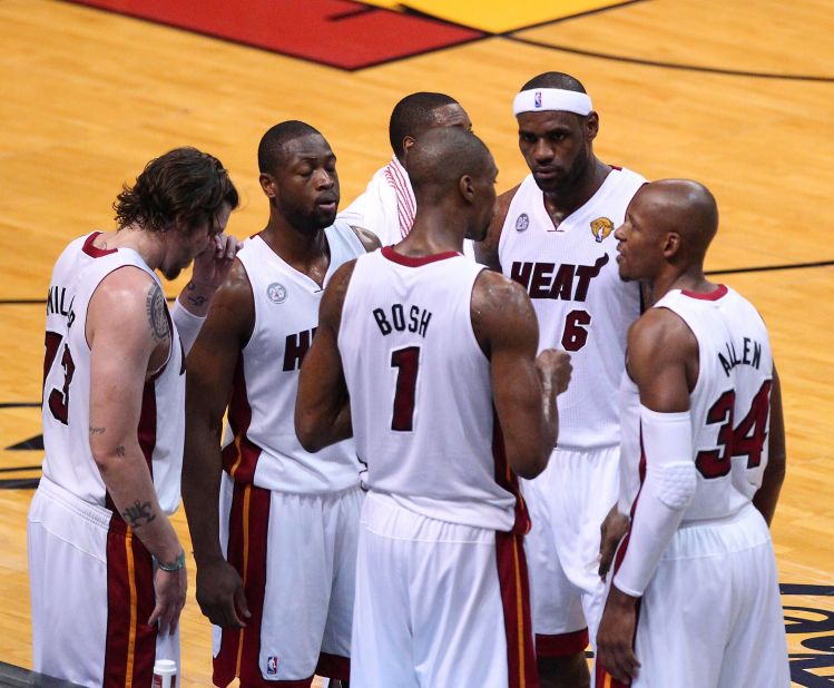 The Miami Heat regroup during a pause in play against the San Antonio Spurs in Game 6.
