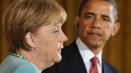 Barack Obama and German Chancellor Angela Merkel hold a joint press conference in the East Room in Washington, DC, June 7, 2011, as part of an official visit.