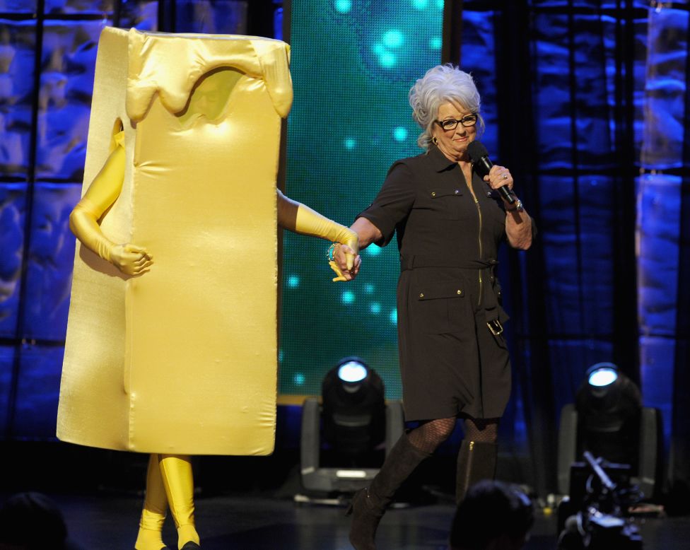 Deen on stage with a costumed Kevin Bacon at Comedy Central's "Night of Too Many Stars: America Comes Together for Autism Programs" in 2012 in New York.