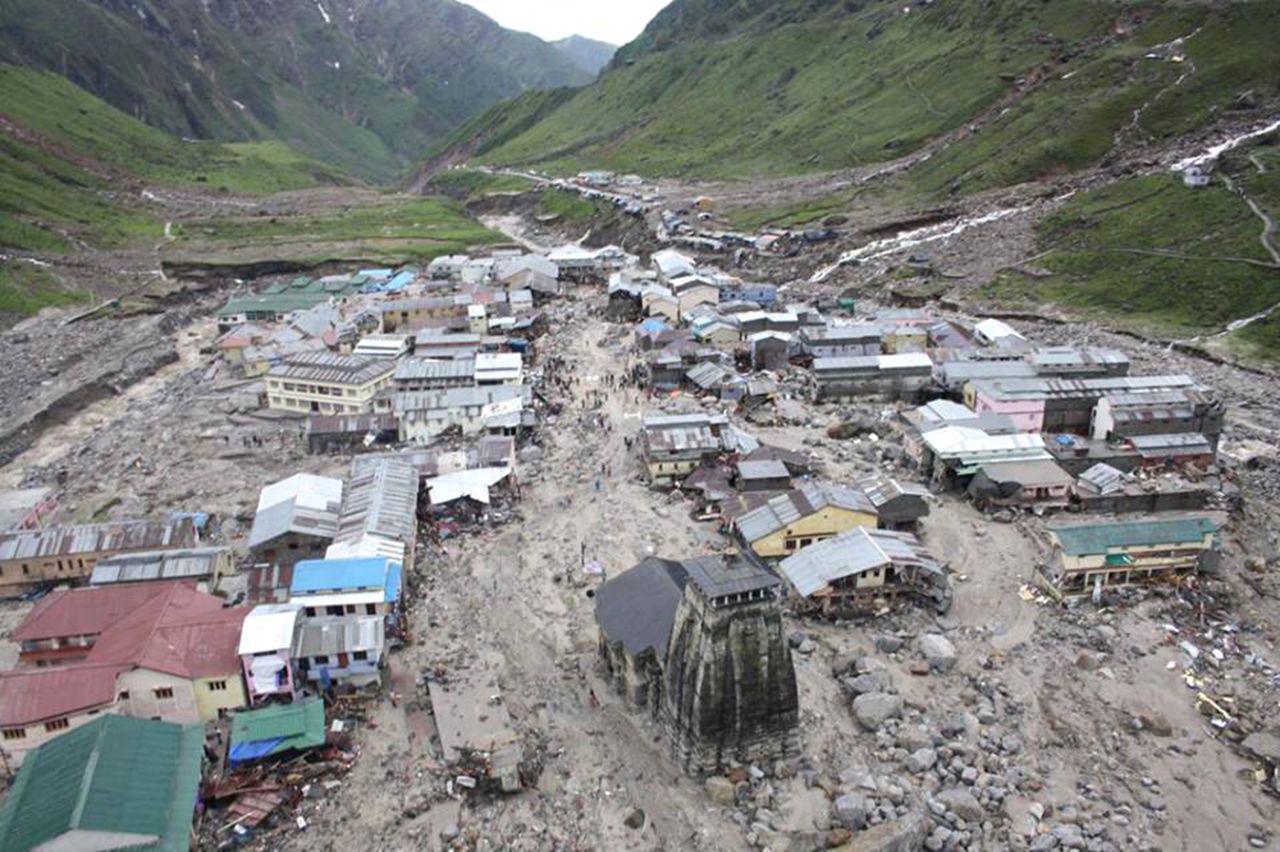 The Kedarnath Temple (C, foreground) is pictured amid flood destruction in the holy Hindu town of Kedarnath in Uttarakhand state on June 18.