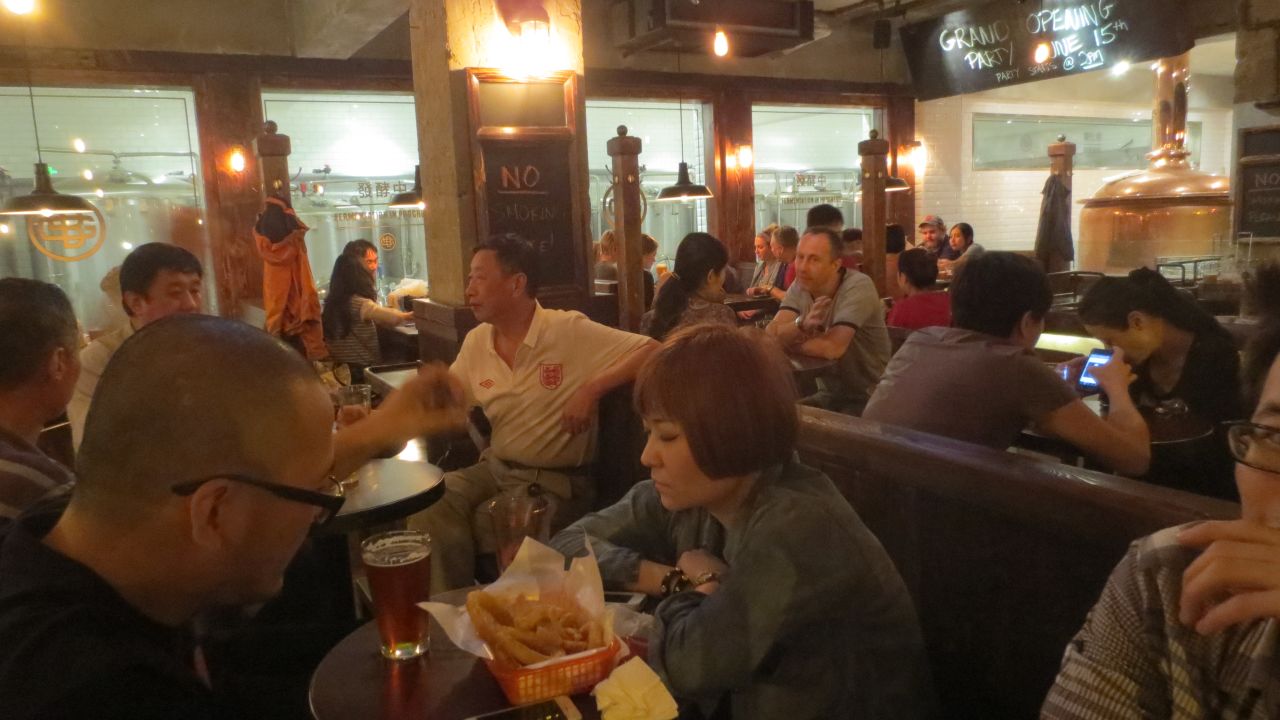 Customers at Greap Leap microbrewery on Xinzhong Street in Beijing.