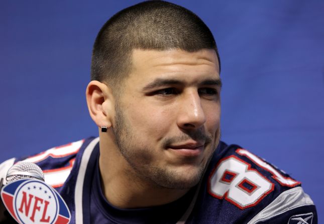 New England Patriots tight end Aaron Hernandez answers questions during Media Day on January 31, 2012, before Super Bowl XLVI against the New York Giants in Indianapolis. 