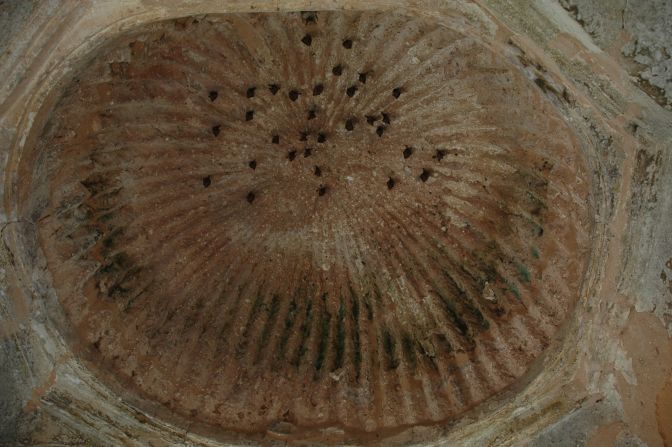 The mosque's great domes, some of which were decorated with porcelain from China, dates from the 13th century.