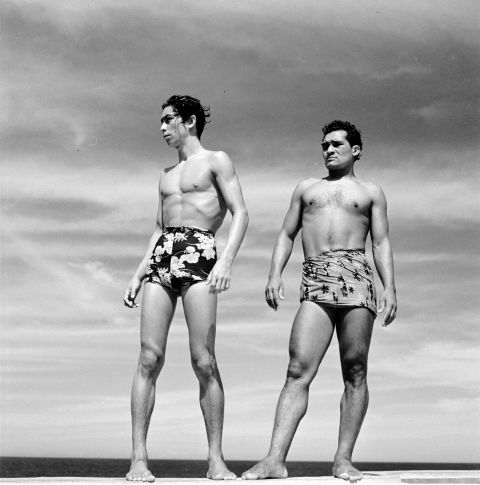 Swimmers in Acapulco, Mexico, show off Hawaiian print swimming trunks in 1950.