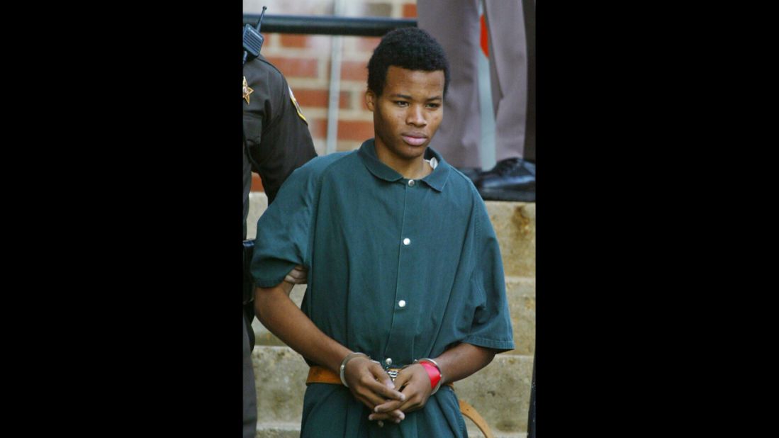 Malvo, 17, walks out of Fairfax County, Virginia, Juvenile Court on November 19, 2002.