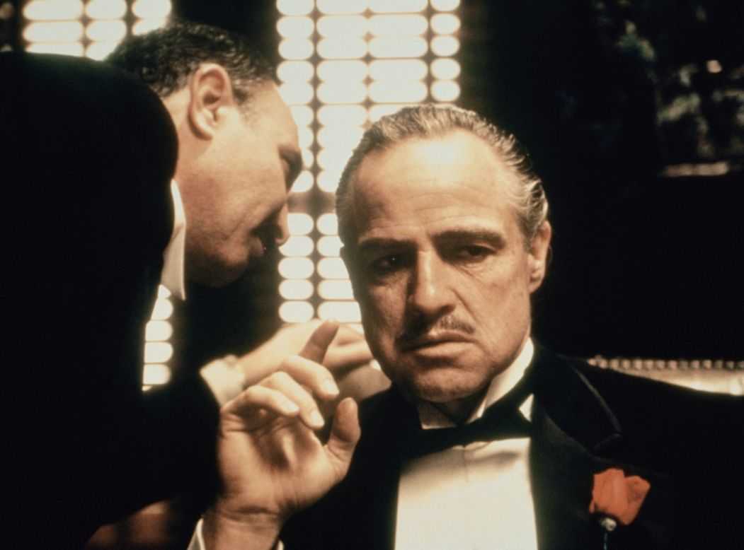 Marlon Brando plays the supreme don in "The Godfather" (1972), directed by Frances Ford Coppola and based on Mario Puzo's best-selling novel. Puzo stitched together slices of reality, weaving a tale so colorful that the FBI's wiretaps later captured real mobsters quoting from the book and subsequent movie.