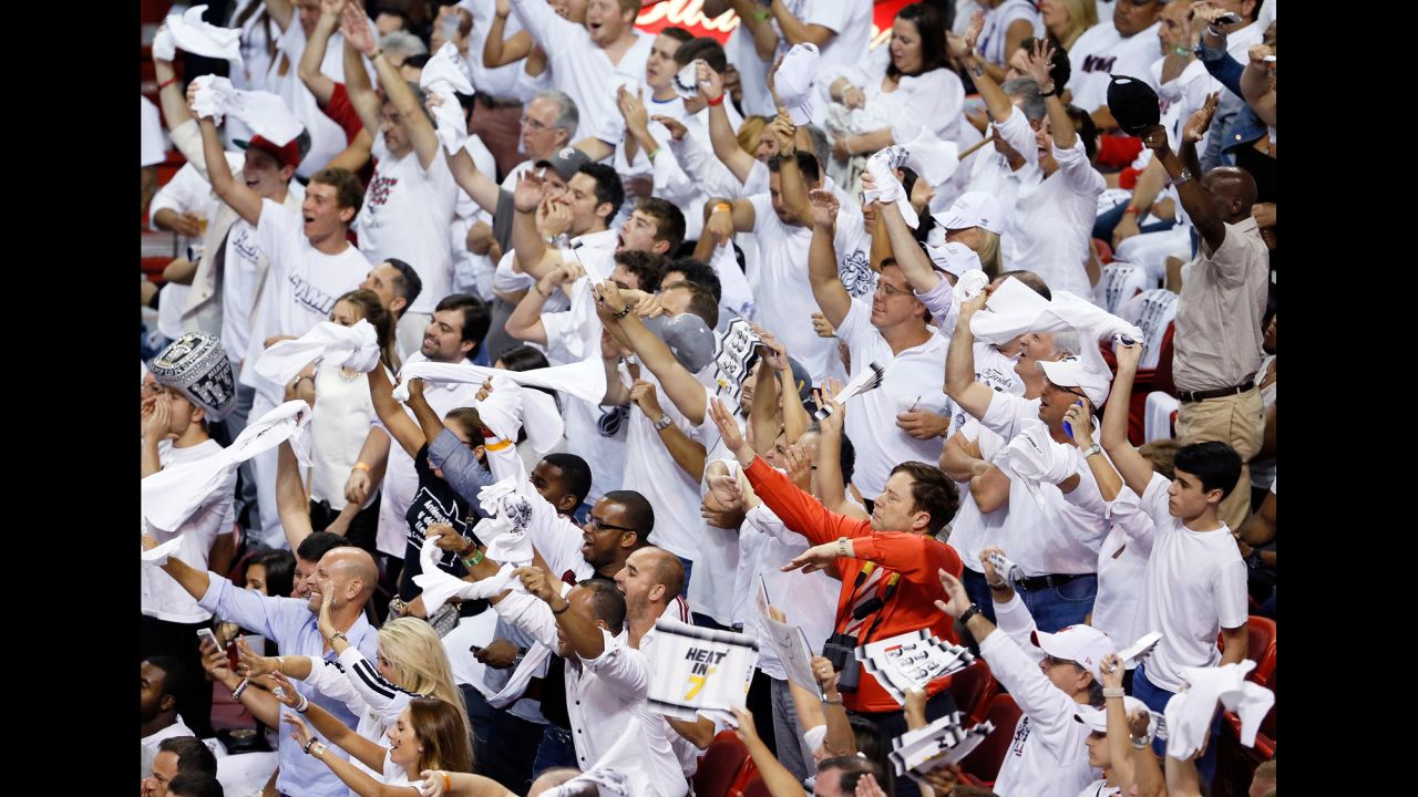 Miami Heat fans cheer in the first half.