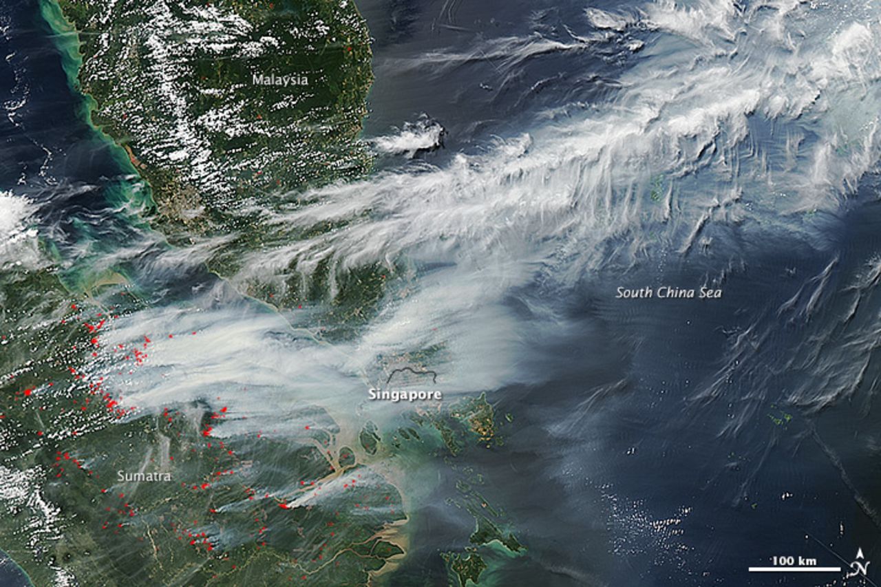 NASA's Terra and Aqua satellites capture images of smoke billowing from wildfires on Sumatra toward Singapore on June 19.