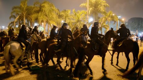 Horse-mounted riot police confront demonstrators in Rio de Janeiro on June 20.
