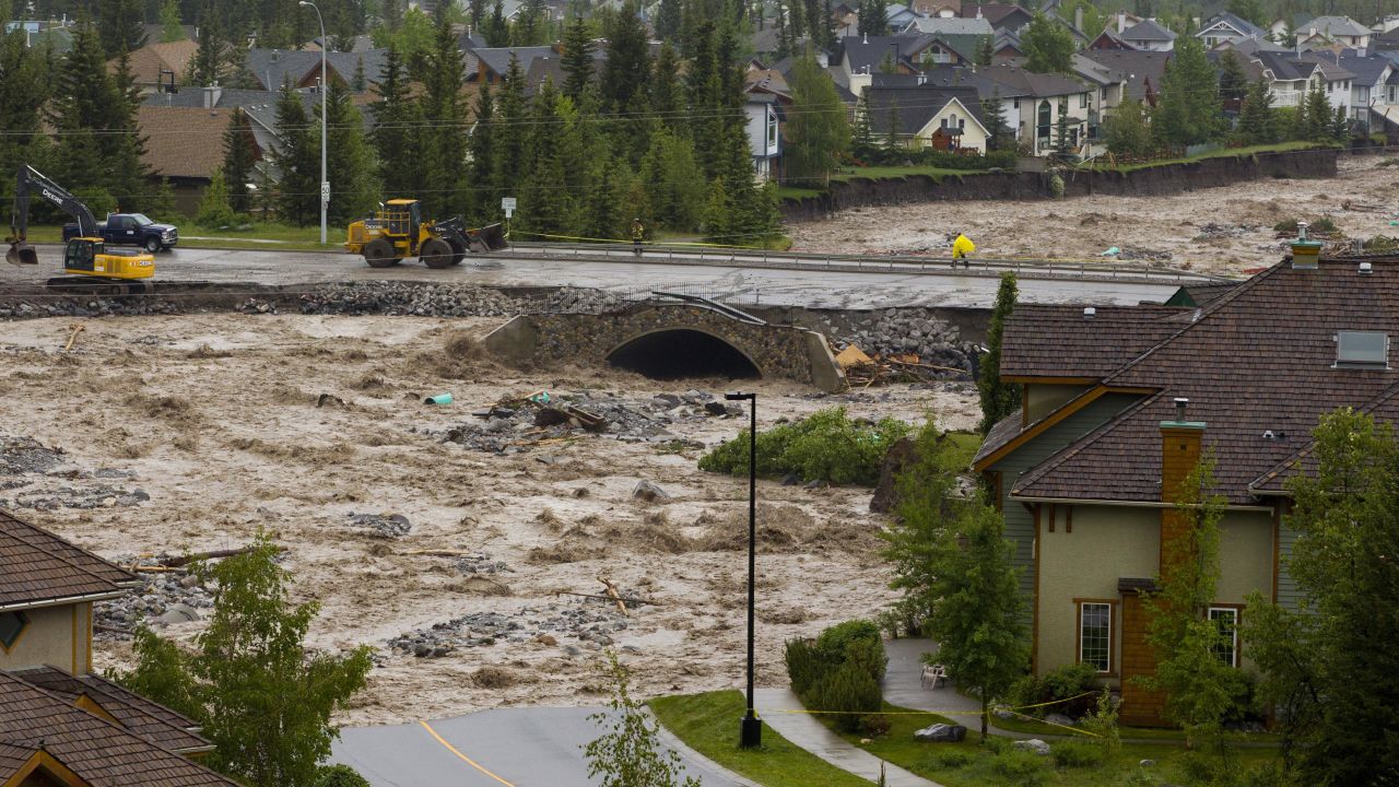 Cougar Creek washes out roads in Canmore on June 20.