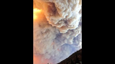 Smoke from the West Fork Fire Complex consisting of the West Fork and Windy Pass fires fills the sky on June 20.