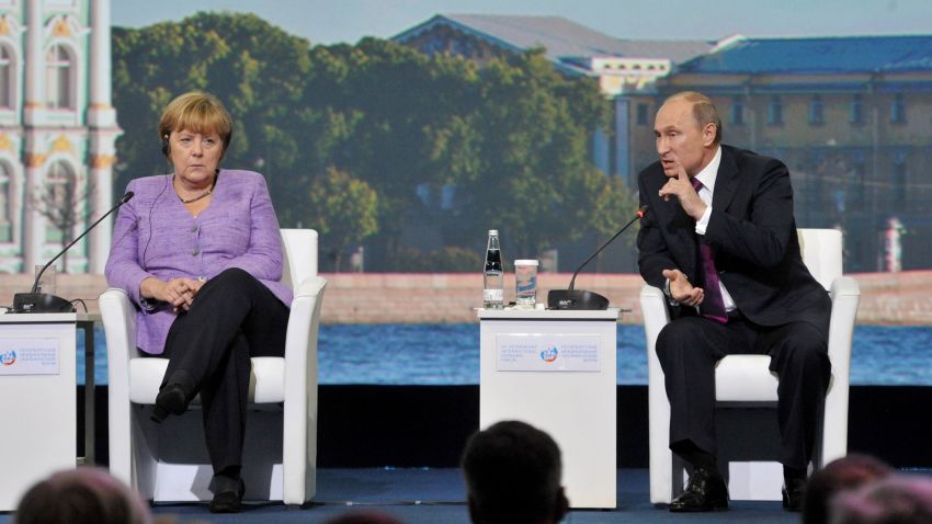 Russia's President Vladimir Putin (R) and Germany's Chancellor Angela Merkel attend an International Economic Forum in St. Petersburg, on June 21, 2013. Putin and Merkel announced today that they would both attend the opening of a Saint Petersburg exhibition including treasures taken by the Red Army at the end of World War II. German officials had said earlier their visit to the "Bronze Age of Europe -- Europe Without Borders" exhibition at the Hermitage museum had been scrapped due to what German media said was a wrangle over the future of the so-called trophy art.
AFP PHOTO / OLGA MALTSEVAOLGA MALTSEVA/AFP/Getty Images