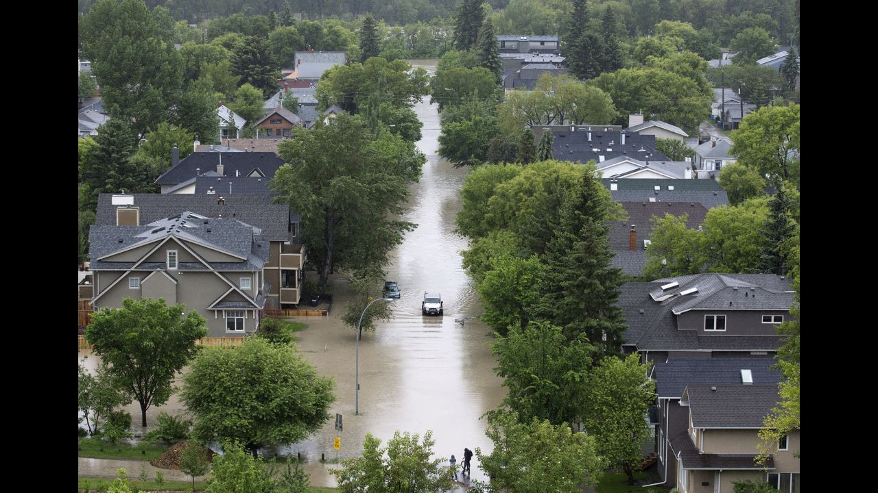 A wide view shows the flooded streets in Calgary's Sunnyside neighborhood on June 21. 