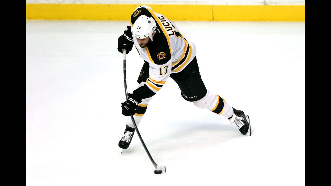 Boston's Milan Lucic shoots the puck.