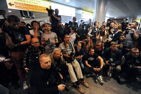 Journalists wait for any sign of Snowden or those who are trying to help him in front of the airport on on June 23, 2013. He has not been spotted yet.