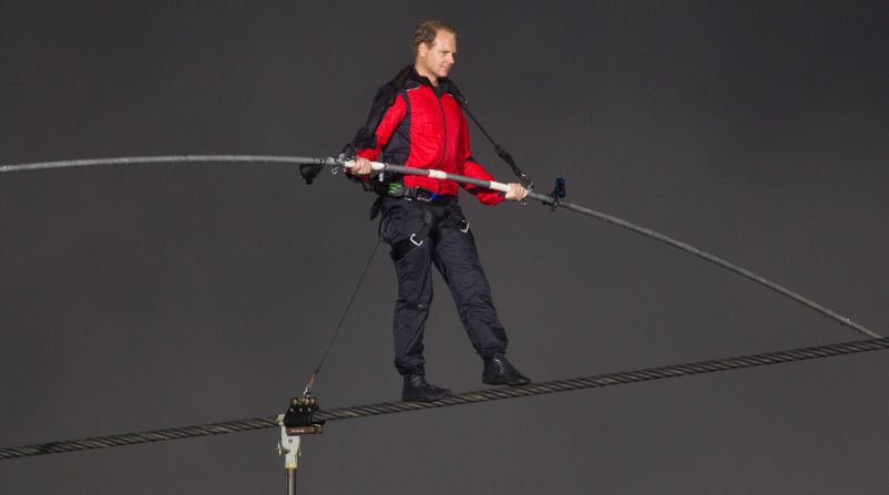The seventh-generation aerialist crosses Niagara Falls in June 2012. The tense 1,800-foot journey took 25 minutes, a CNN affiliate reported.