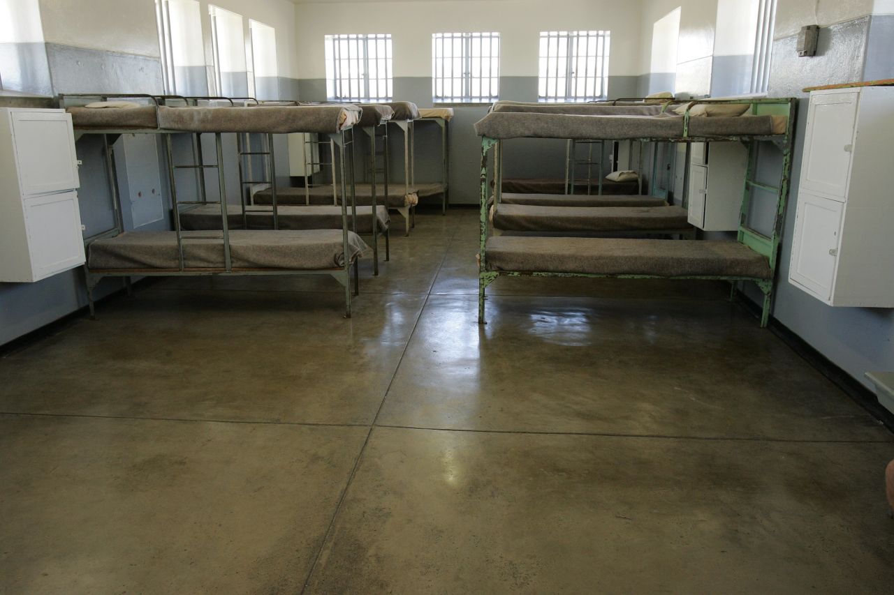 Group prison barracks sit empty in the facility.